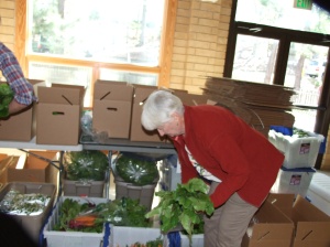 Mrs. Glover distributes the greens